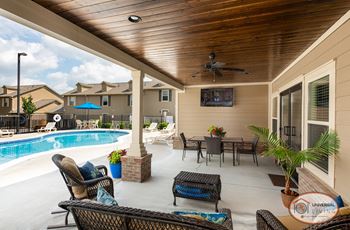 Outdoor pavilion with flat screen tv, and food area